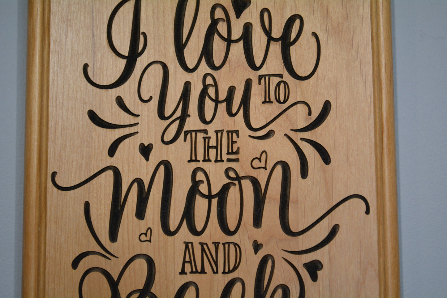 "I love you to the moon and back" sign